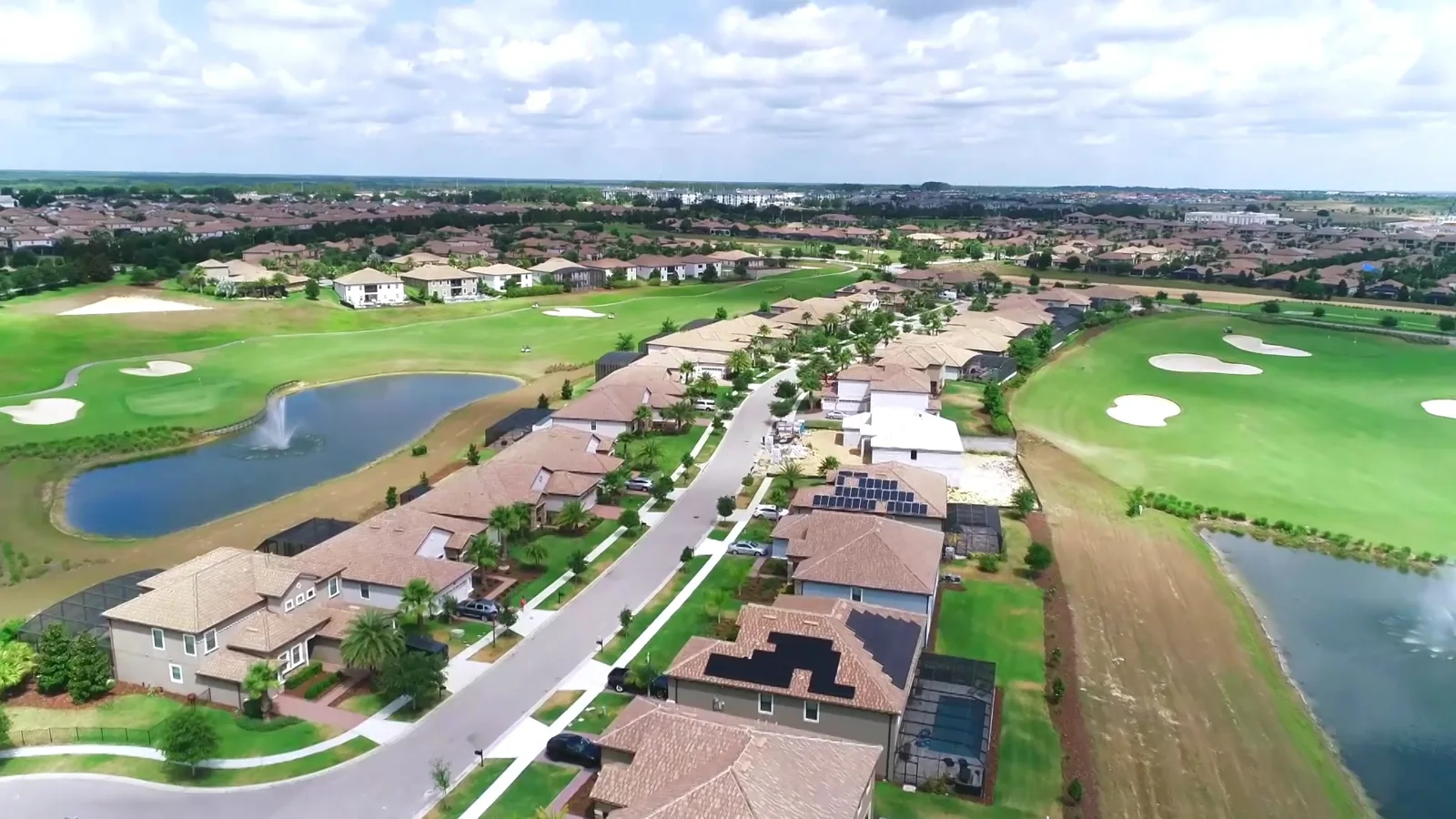 Aerial view of a Florida resort residential community and golf course